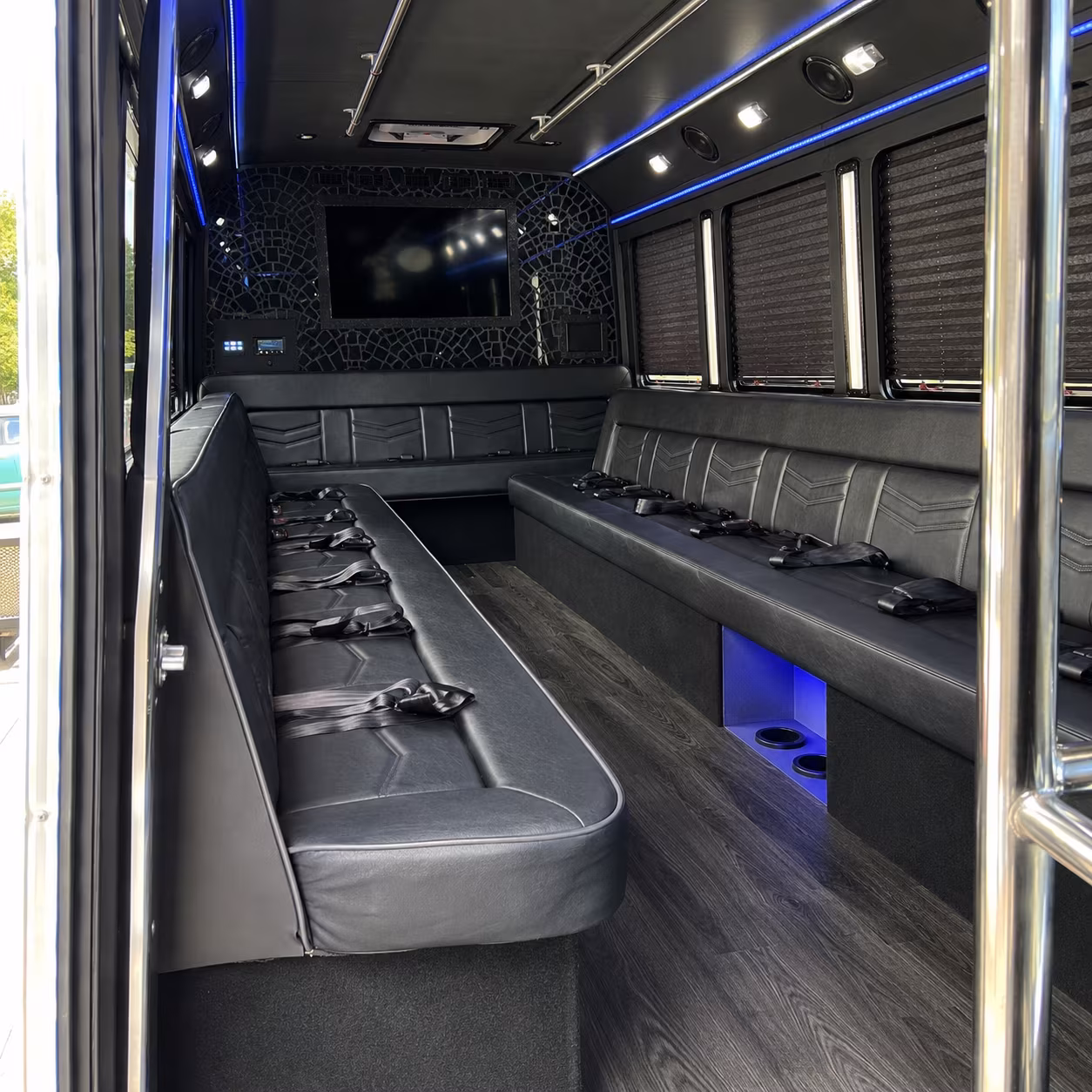 Group beside a Mercedes Sprinter limo in Cincinnati
